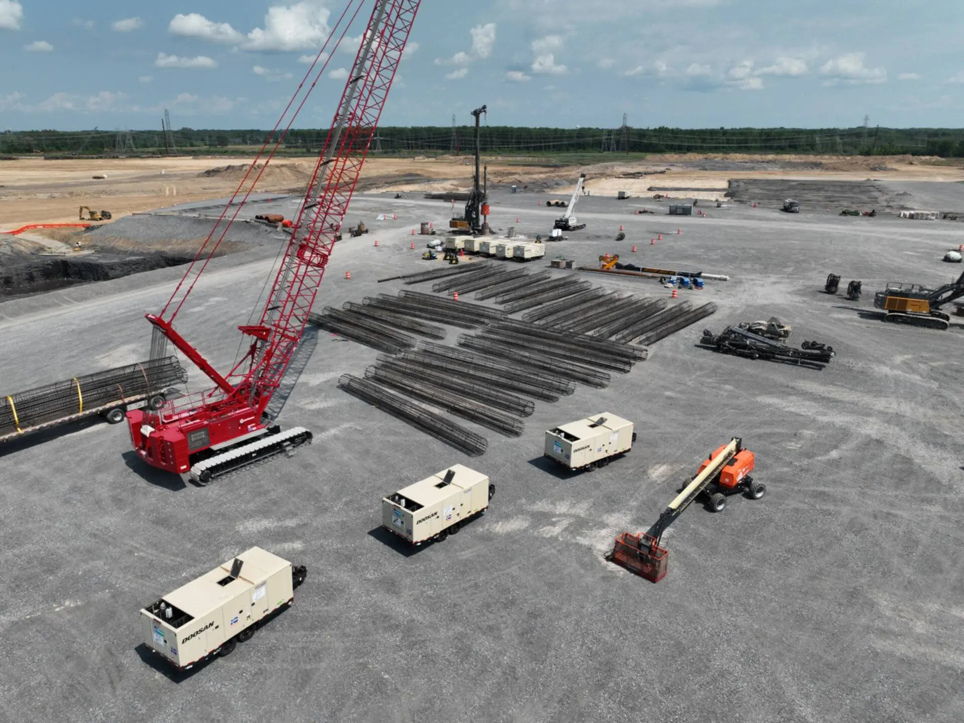 Aerial view of pile foundation cages staged on a utility scale construction site in Central New York